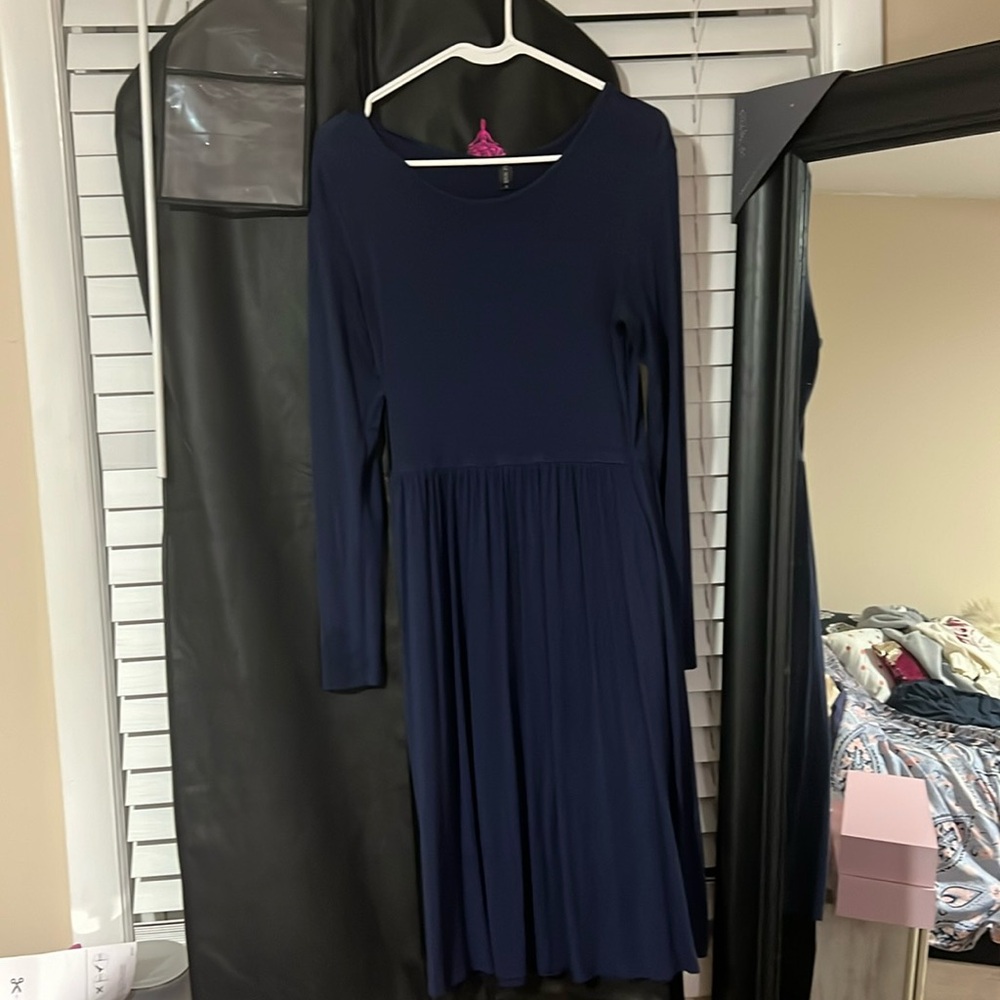 Navy dress, not worn many times, pockets, length goes to the knees